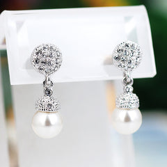 Contemporary Pearl Earrings with Silver Accents Silvery